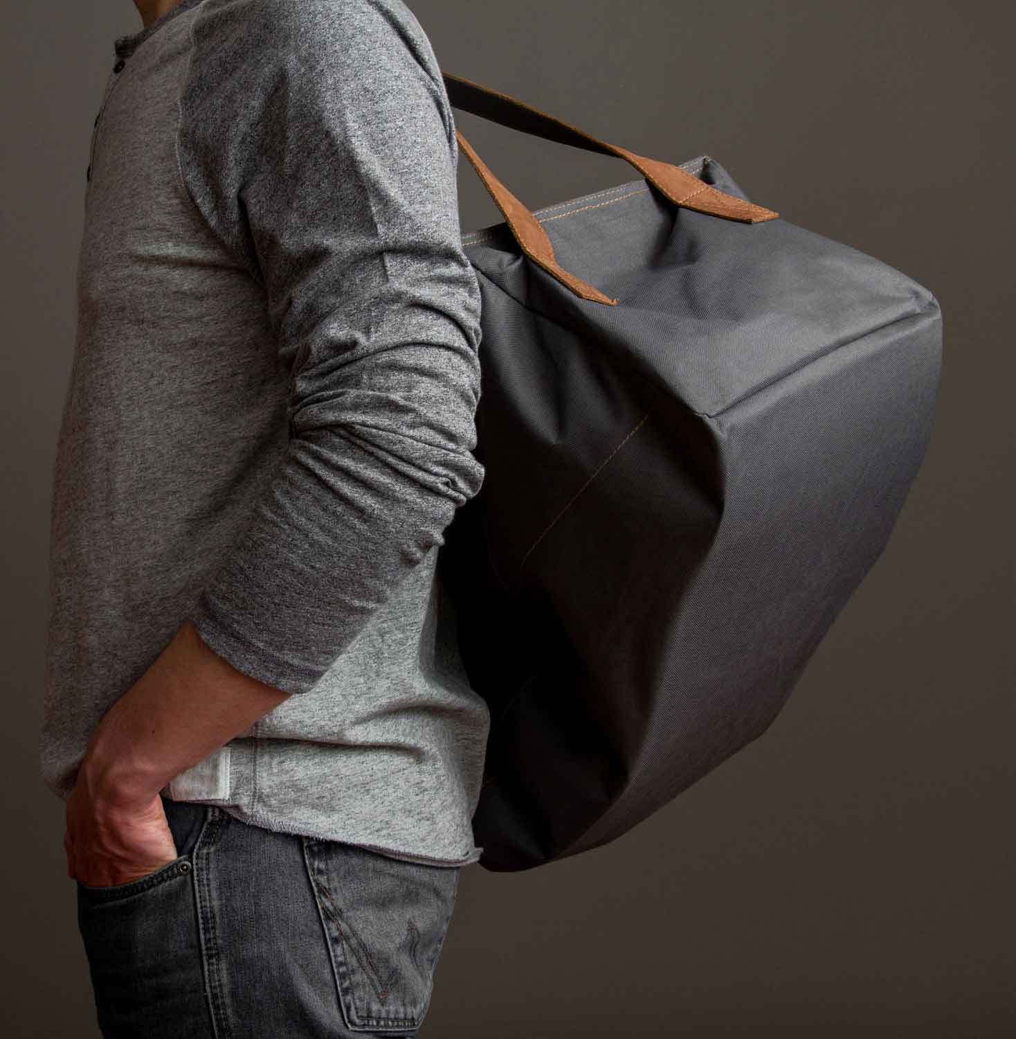 Bolso de viaje tela y cuero vacuno